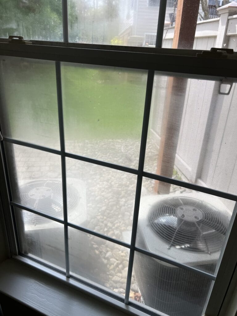 Before specialty window cleaning on residential building