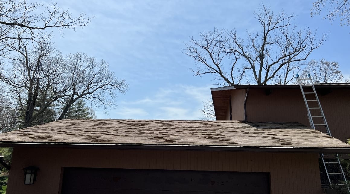 Roof cleaned after residential roof washing service