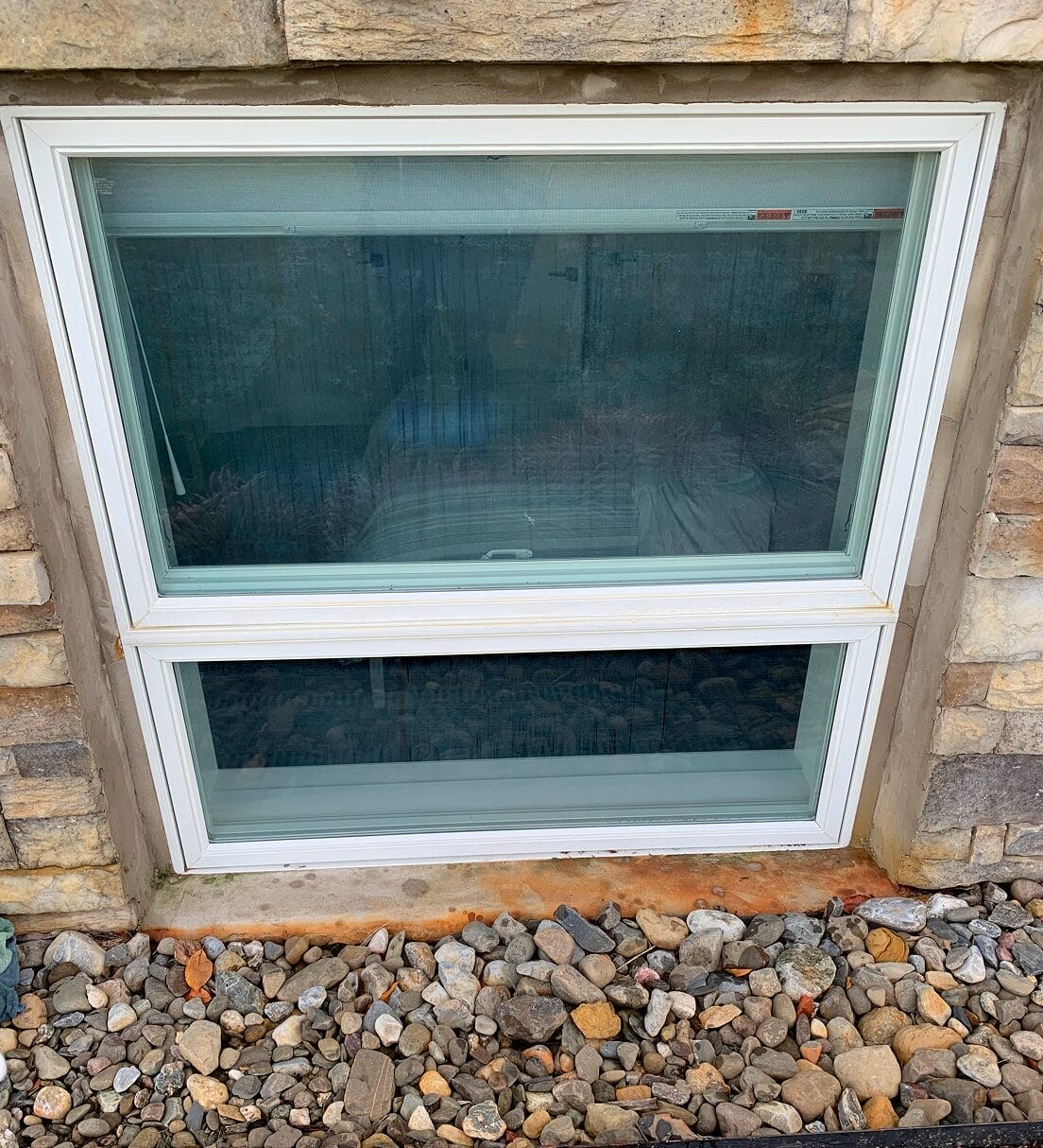 Residential window before cleaning and restoration